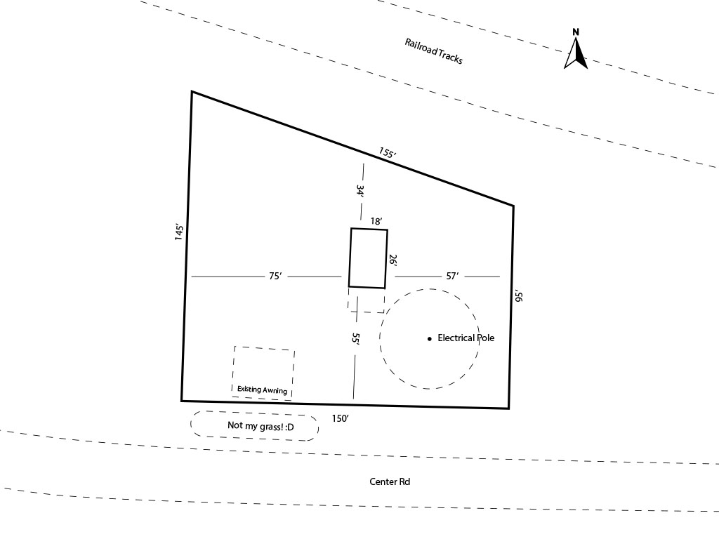 Sitemap of small building between a street and railroad tracks
